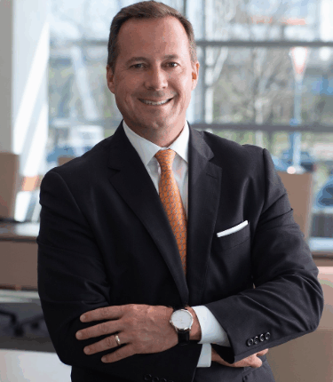 headshot of John M. Starcher, Jr, President & CEO of Bon Secours Mercy Health